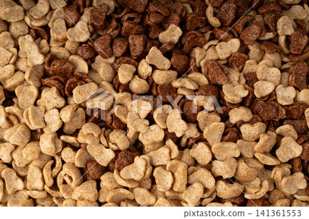 Chocolate cereal flakes texture background, rice crispy breakfast pattern Chocolate cereal flakes texture background, rice crispy breakfast pattern 141361553
