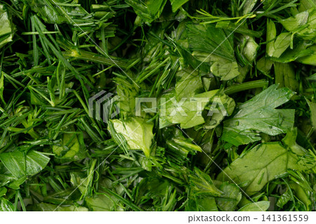 Fresh chopped herbs textured background Fresh chopped herbs textured background 141361559