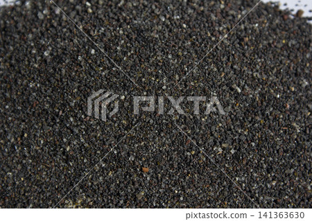 This is a close-up of black sand. This is a close-up of black sand. 141363630
