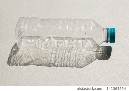 It is an empty plastic bottle. It is an empty plastic bottle. 141363634