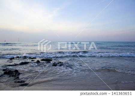 Jeju Island beach at sunset. Jeju Island beach at sunset. 141363651