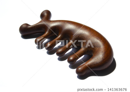 It is a massage tool made of solid wood. It is a massage tool made of solid wood. 141363676