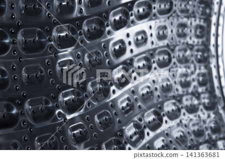 Inside of the washing machine drum . Inside of the washing machine drum . 141363681