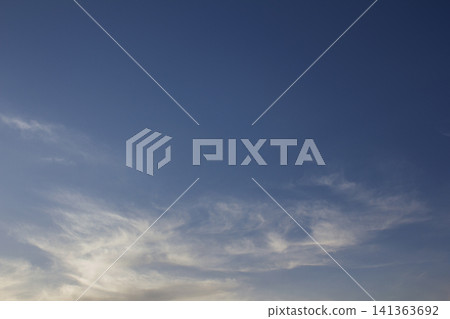 It is a sky with feathery clouds. It is a sky with feathery clouds. 141363692