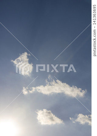 It is a blue sky illuminated by sunlight. 141363695