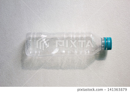 It is an empty plastic bottle. It is an empty plastic bottle. 141363879