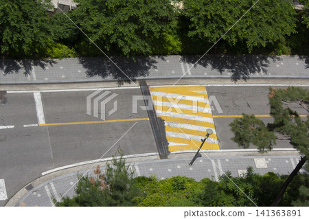 Top view of a road with speed bumps 141363891