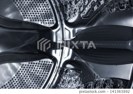 Inside of the washing machine drum . Inside of the washing machine drum . 141363892