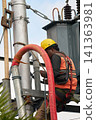 A high-voltage electrician on site 141363981