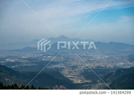 A distant view of the Kumamoto Plain, Mt. Kinpo, and the hazy Mt. Unzen Fugen from Kusasenri, Kumamoto Prefecture. A distant view of the Kumamoto Plain, Mt. Kinpo, and the hazy Mt. Unzen Fugen from Kusasenri, Kumamoto Prefecture. 141364299