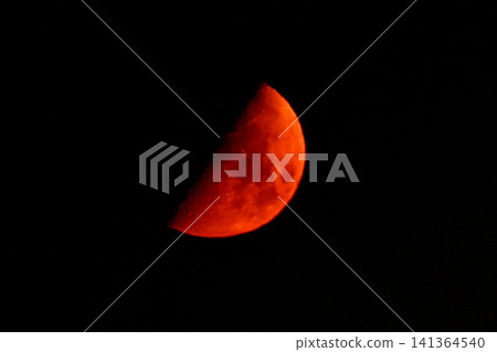 A setting red crescent moon A setting red crescent moon 141364540