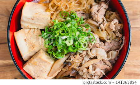 Pork and tofu rice bowl with shirataki noodles and shimeji mushrooms. Pork and tofu rice bowl with shirataki noodles and shimeji mushrooms. 141365854