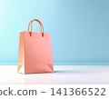Minimalistic and stylish consumers. Paper shopping bag on a white background. Bag mockup in orange color for promoting brands. 141366522