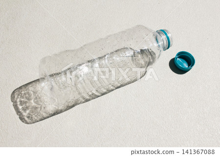 It is an empty plastic bottle. It is an empty plastic bottle. 141367088