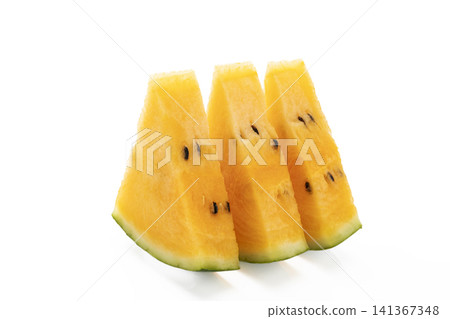A sliced yellow watermelon against a white background. A sliced yellow watermelon against a white background. 141367348