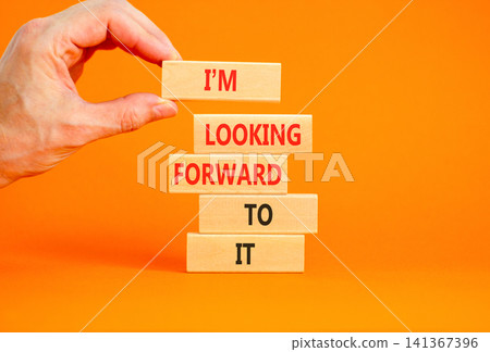 I'm looking forward to it symbol. Concept words I'm looking forward to it on beautiful wooden blocks. Beautiful orange background. Business and I'm looking forward to it concept. Copy space. I'm looking forward to it symbol. Concept words I'm looking forward to it on beautiful wooden blocks. Beautiful orange background. Business and I'm looking forward to it concept. Copy space. 141367396