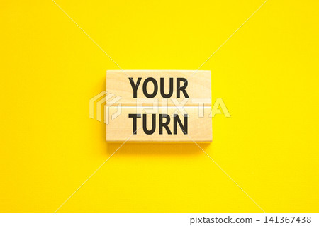 Your turn words symbol. Concept words Your turn on beautiful wooden blocks. Beautiful yellow background. Business your turn motivational support concept. Copy space. Your turn words symbol. Concept words Your turn on beautiful wooden blocks. Beautiful yellow background. Business your turn motivational support concept. Copy space. 141367438