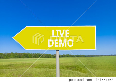 Live demo symbol. Concept words Live demo on beautiful yellow road sign. Beautiful blue sky green grass field background. Copy space. Business and live demo concept. Live demo symbol. Concept words Live demo on beautiful yellow road sign. Beautiful blue sky green grass field background. Copy space. Business and live demo concept. 141367562