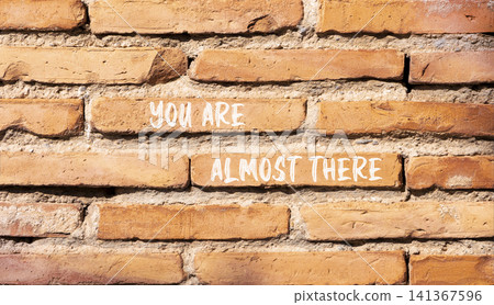 You are almost there words symbol. Concept words You are almost there on beautiful brick wall. Beautiful brick wall background. Business You are almost there motivational support concept. Copy space. You are almost there words symbol. Concept words You are almost there on beautiful brick wall. Beautiful brick wall background. Business You are almost there motivational support concept. Copy space. 141367596