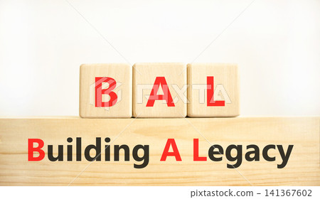 BAL building a legacy symbol. Concept words BAL building a legacy on beautiful wooden blocks. Beautiful white background. Business BAL building a legacy concept. Copy space. BAL building a legacy symbol. Concept words BAL building a legacy on beautiful wooden blocks. Beautiful white background. Business BAL building a legacy concept. Copy space. 141367602
