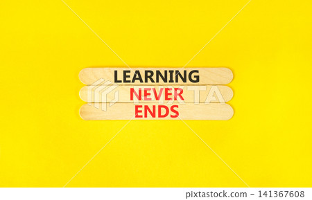 Learning never ends words symbol. Concept words Learning never ends on beautiful wooden sticks. Beautiful yellow background. Business support motivational and learning never ends concept. Copy space. Learning never ends words symbol. Concept words Learning never ends on beautiful wooden sticks. Beautiful yellow background. Business support motivational and learning never ends concept. Copy space. 141367608