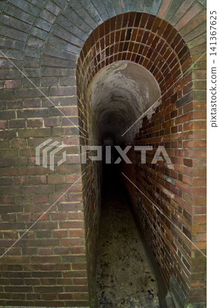 A scene from the remains of a brick-built gun battery of the former Japanese army on Tomogashima Island in Wakayama Prefecture. A scene from the remains of a brick-built gun battery of the former Japanese army on Tomogashima Island in Wakayama Prefecture. 141367625