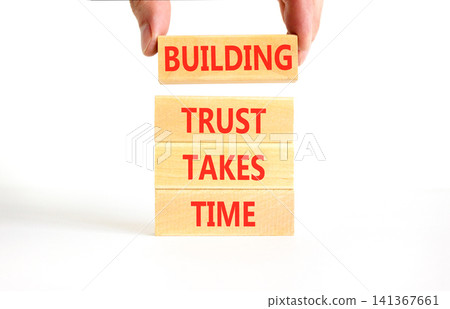 Building trust takes time words symbol. Concept words Building trust takes time on beautiful wooden blocks. Beautiful white background. Business building trust takes time concept. Copy space. Building trust takes time words symbol. Concept words Building trust takes time on beautiful wooden blocks. Beautiful white background. Business building trust takes time concept. Copy space. 141367661