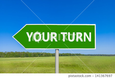 Your turn words symbol. Concept words Your turn on beautiful green road sign. Beautiful blue sky green field background. Business your turn motivational support concept. Copy space. Your turn words symbol. Concept words Your turn on beautiful green road sign. Beautiful blue sky green field background. Business your turn motivational support concept. Copy space. 141367697