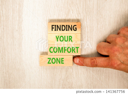 Finding your comfort zone words symbol. Concept words Finding your comfort zone on beautiful wooden blocks. Beautiful grey background. Psychological finding your comfort zone concept. Copy space. Finding your comfort zone words symbol. Concept words Finding your comfort zone on beautiful wooden blocks. Beautiful grey background. Psychological finding your comfort zone concept. Copy space. 141367756