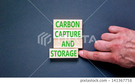 Carbon capture and storage words symbol. Concept words Carbon capture and storage on beautiful wooden blocks. Beautiful grey background. Business carbon capture and storage concept. Copy space. Carbon capture and storage words symbol. Concept words Carbon capture and storage on beautiful wooden blocks. Beautiful grey background. Business carbon capture and storage concept. Copy space. 141367758