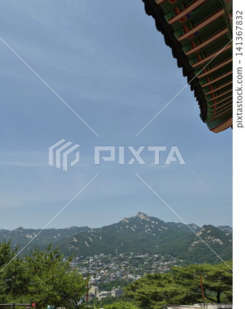 A Seoul landscape featuring mountains and the sky. A Seoul landscape featuring mountains and the sky. 141367832
