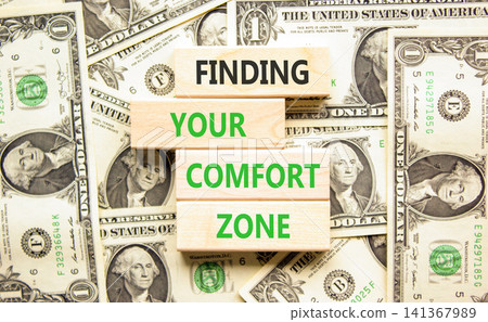 Finding your comfort zone symbol. Concept words Finding your comfort zone on beautiful wooden blocks. Beautiful dollar bills background. Psychological finding your comfort zone concept. Copy space. Finding your comfort zone symbol. Concept words Finding your comfort zone on beautiful wooden blocks. Beautiful dollar bills background. Psychological finding your comfort zone concept. Copy space. 141367989