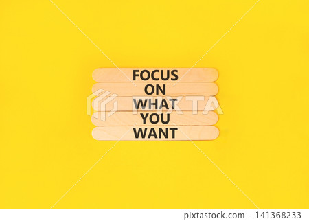 Focus on what you want symbol. Concept words Focus on what you want on beautiful wooden sticks. Beautiful yellow background. Psychological and focus on what you want concept. Copy space. Focus on what you want symbol. Concept words Focus on what you want on beautiful wooden sticks. Beautiful yellow background. Psychological and focus on what you want concept. Copy space. 141368233