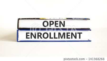 Open enrollment words symbol. Concept words Open enrollment on beautiful books. Beautiful white background. Medical and Open enrollment words concept. Copy space. Open enrollment words symbol. Concept words Open enrollment on beautiful books. Beautiful white background. Medical and Open enrollment words concept. Copy space. 141368268