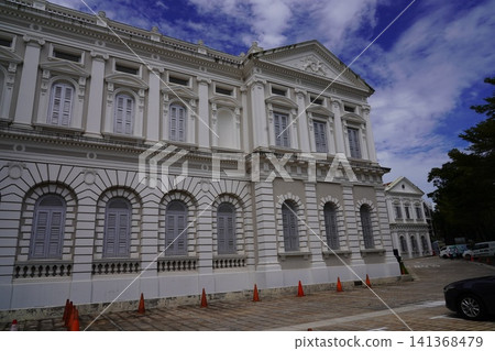 Elegant White Building with Classic Architectural Style Elegant White Building with Classic Architectural Style 141368479