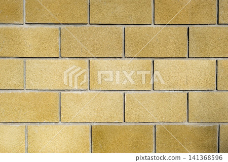 yellow brick wall background 141368596