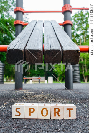 motivational word Sport made of letters on wooden cubes motivational word Sport made of letters on wooden cubes 141368637