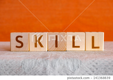 motivational word Skill made of letters on wooden cubes motivational word Skill made of letters on wooden cubes 141368639