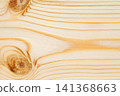 background of wood with fibers with knots close-up 141368663