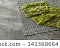 dried green nori sheets on table, selective focus 141368664