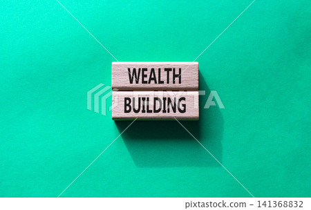 WEALTH BUILDING symbol. Concept word WEALTH BUILDING on wooden blocks. Beautiful green background. Business and WEALTH BUILDING concept. Copy space WEALTH BUILDING symbol. Concept word WEALTH BUILDING on wooden blocks. Beautiful green background. Business and WEALTH BUILDING concept. Copy space 141368832