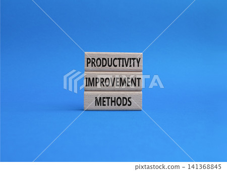 Productivity improvement methods symbol. Concept word Productivity improvement methods on wooden blocks. Beautiful blue background. Business and Productivity improvement methods. Copy space Productivity improvement methods symbol. Concept word Productivity improvement methods on wooden blocks. Beautiful blue background. Business and Productivity improvement methods. Copy space 141368845