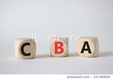 CBA - Cost Benefit Analysis symbol. Wooden cubes with word CBA. Beautiful white background. Business and Cost Benefit Analysis concept. Copy space. 141369004