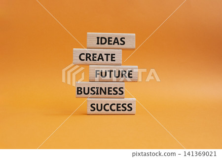 Business success symbol. Wooden blocks with words Ideas create future business success. Beautiful orange background. Business and Business success concept. Copy space 141369021