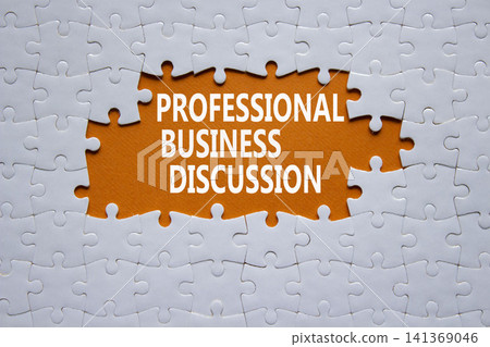 Professional Business Discussion symbol. White puzzle with words Professional Business Discussion. Beautiful orange background. Business concept. Copy space. 141369046