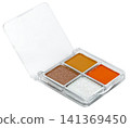 Open makeup palette featuring four warm shades: orange, mustard yellow, shimmer brown, and white glitter. Transparent plastic square case isolated. Professional beauty product. 141369450