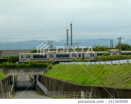 A commuter train running from Ichinoseki in Iwate Prefecture to Morioka passes through the rural landscape of Shiwa District. A commuter train running from Ichinoseki in Iwate Prefecture to Morioka passes through the rural landscape of Shiwa District. 141369890