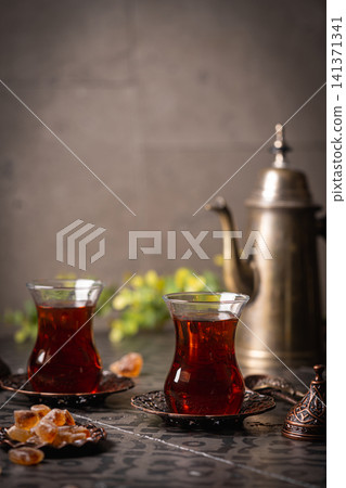 Turkish tea in traditional glass Turkish tea in traditional glass 141371341