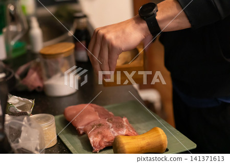 Trimmed Raw Pork Meat on Cutting Board With Mortar Pestle Trimmed Raw Pork Meat on Cutting Board With Mortar Pestle 141371613