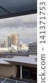 High-rise apartments visible outside 141371753